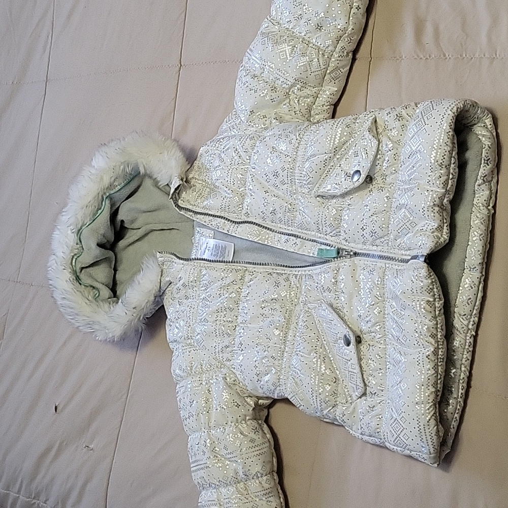 thick winter coat w matching snow pants. White w silver print coat. Blue pants.